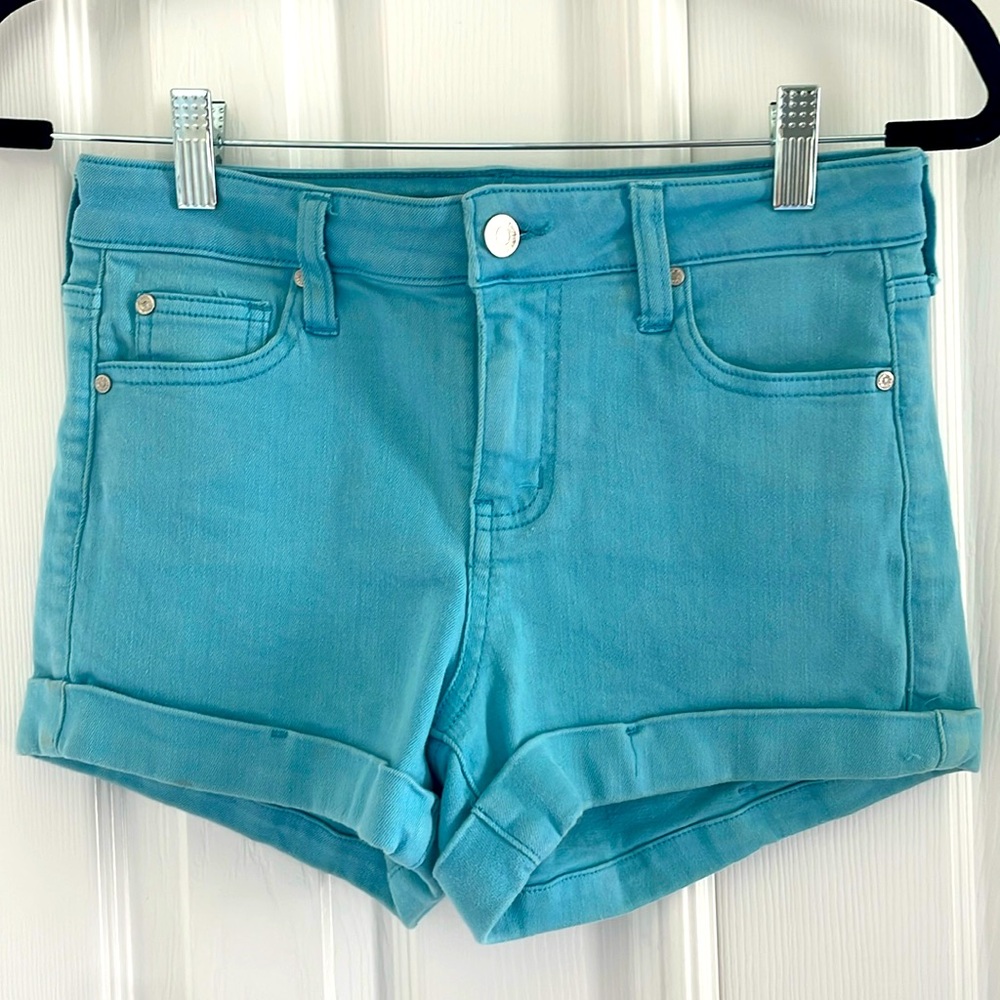 Celebrity Pink turquoise-colored shorts.